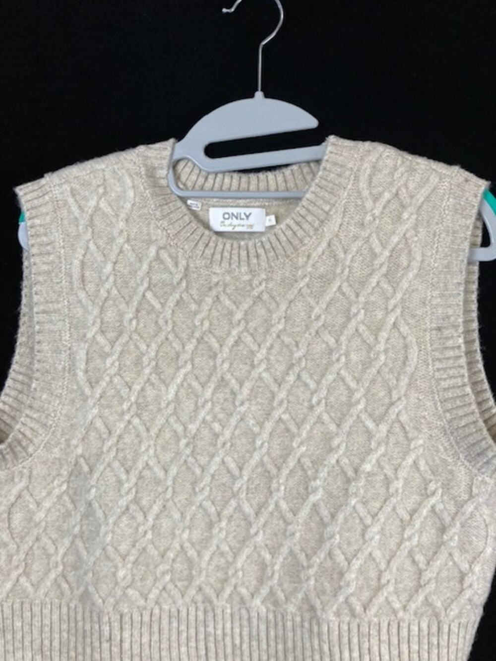 Only women's beige cable knit sweater vest w/crew neckline.
